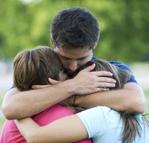  A family embrace.