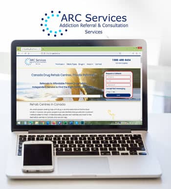  Laptop with ARC Services’ website.