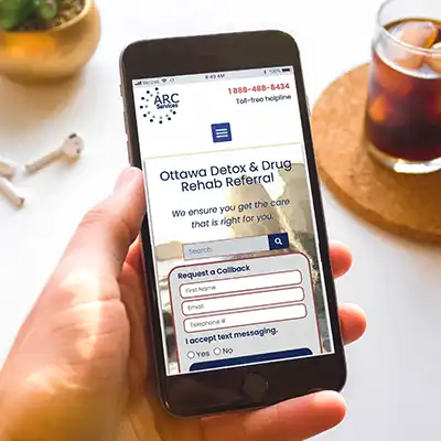 Cellphone with addiction treatment Ottawa on it.