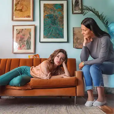 Daughter and mother talking about relapse