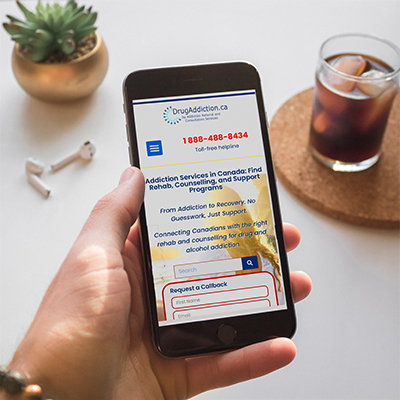 Cellphone showing home page of DrugAddiction.ca.