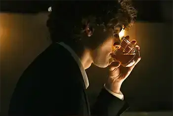  A man drinking alone.