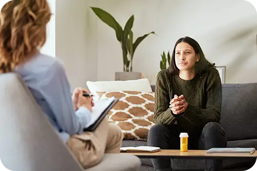  A person with a drug counsellor.